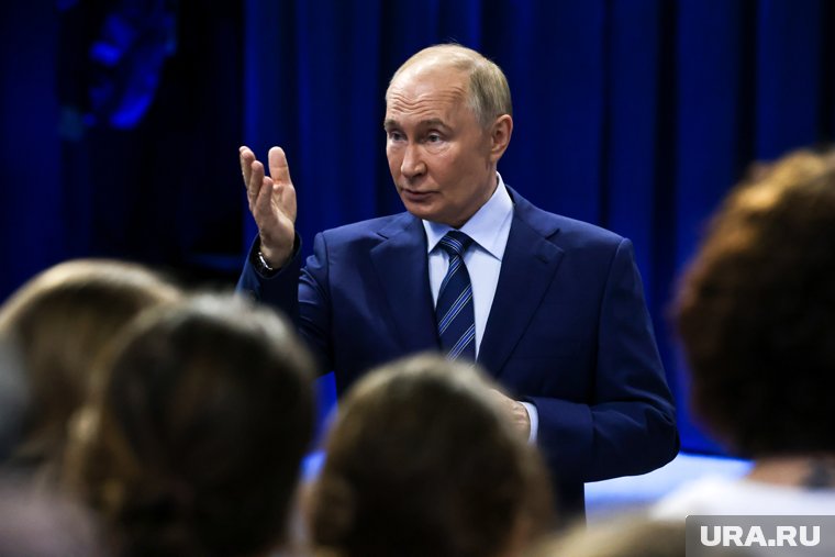 Путин укрепляет команду чемпионов из России