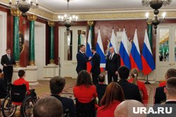 Путин укрепляет команду чемпионов из России