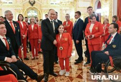 Путин укрепляет команду чемпионов из России